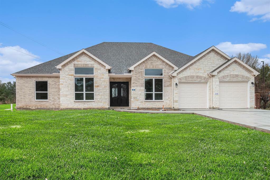 Property Photo: 208 Wells TX 77445