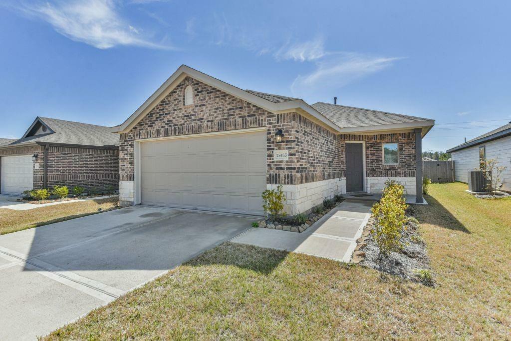 Property Photo: 25455 Blue Mistflower Drive TX 77316
