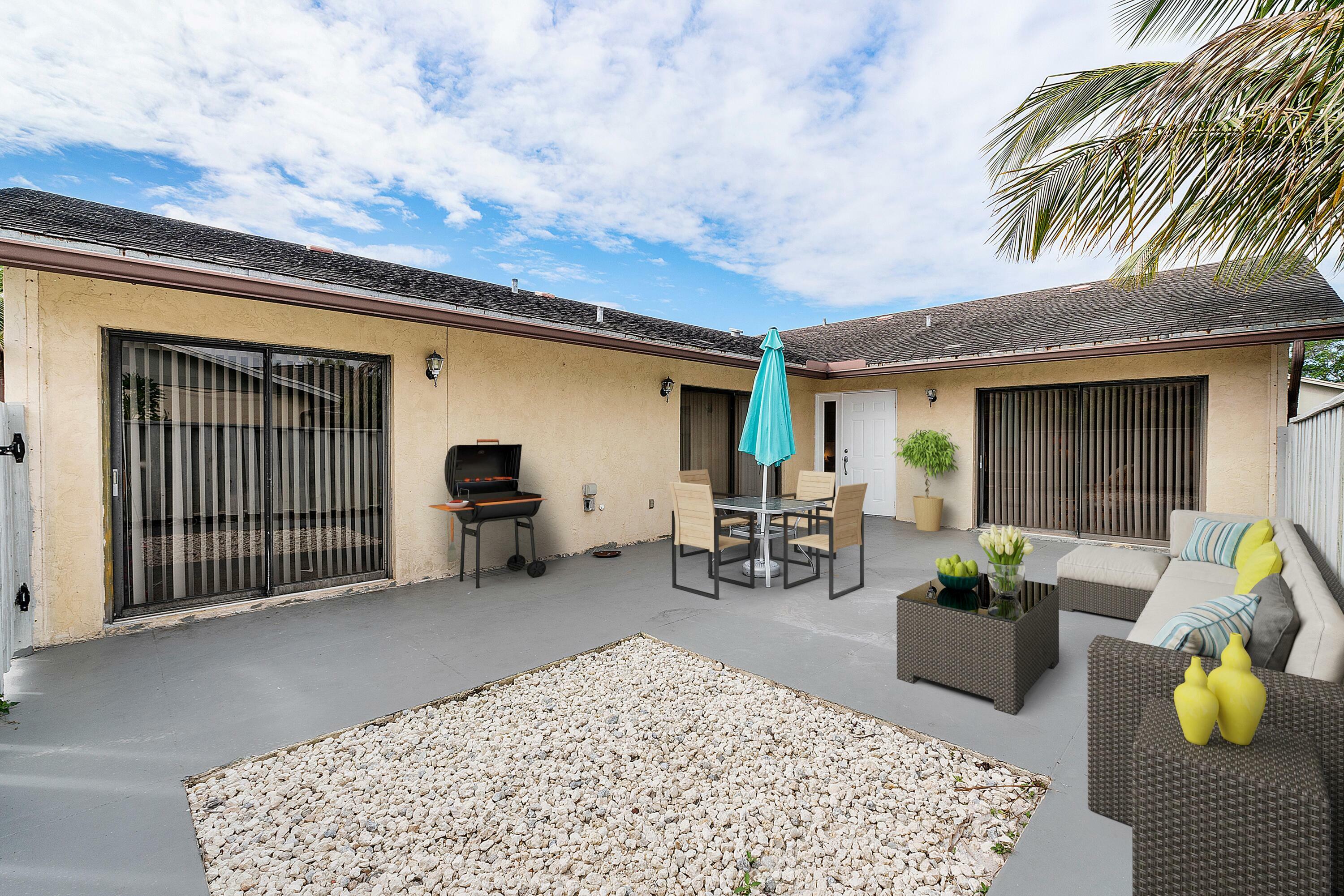 Property Photo: 8202 Ambach Way FL 33462