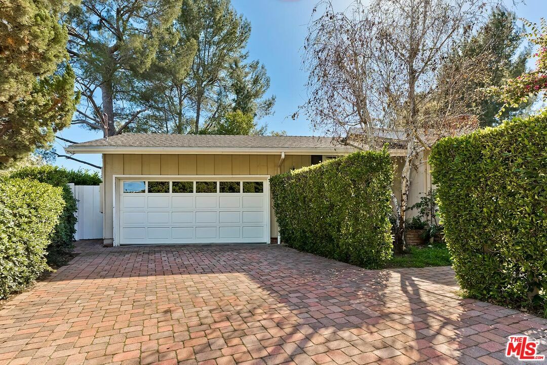 Property Photo:  751   Teakwood Rd  CA 90049 