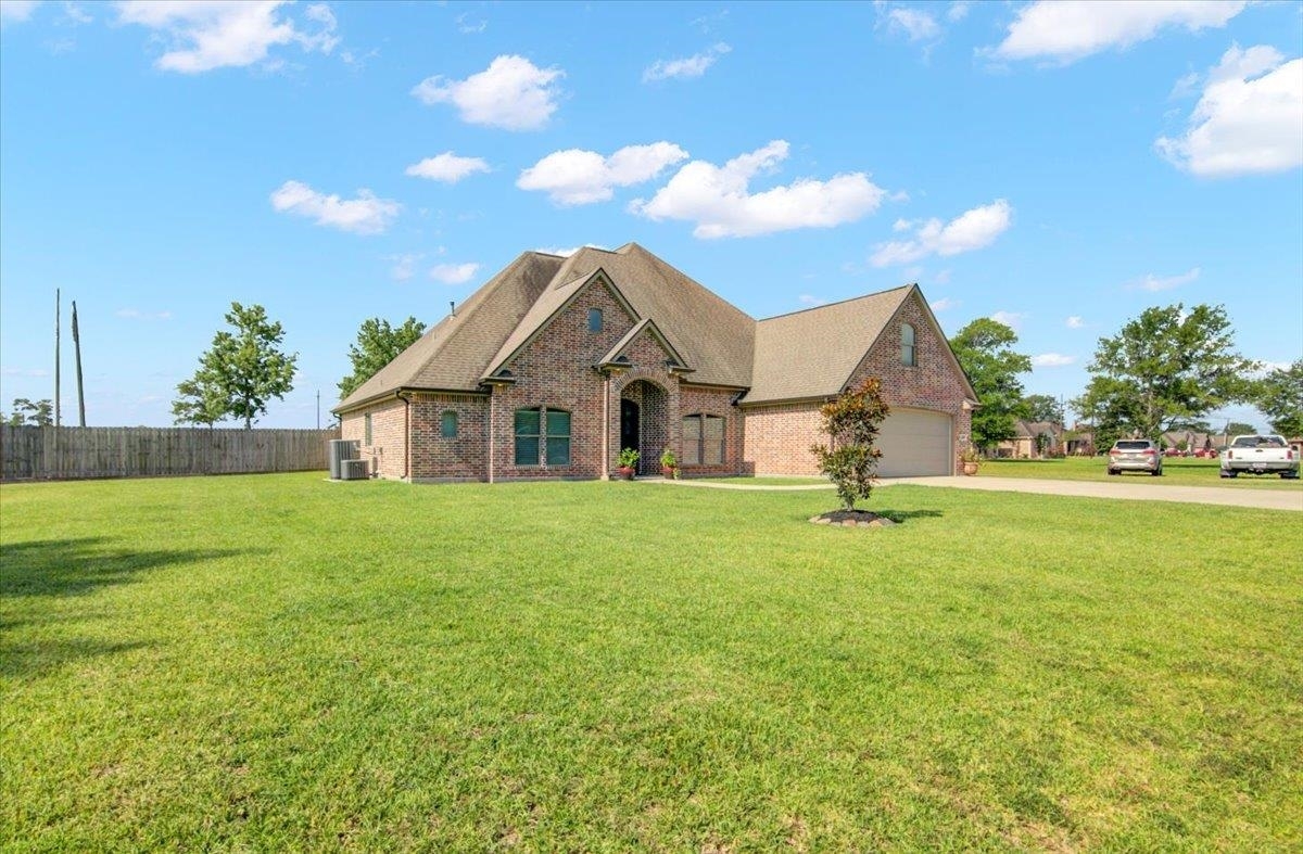 Property Photo: 10185 E Greenwood Dr. TX 77630