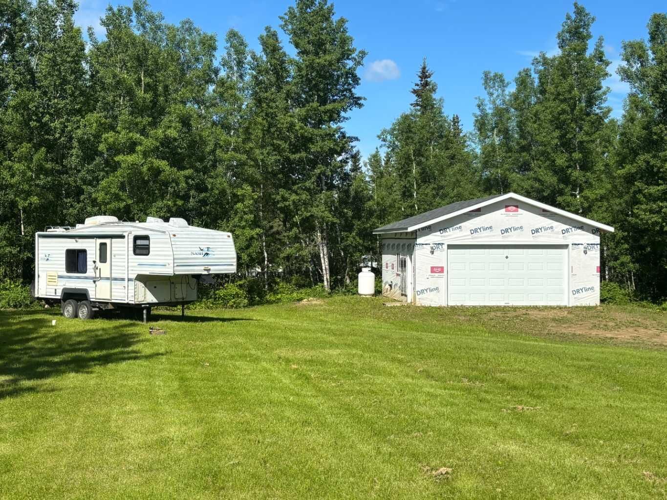 Property Photo: 660022 - Range Road 225.5 (Unit 57) #222 AB T9S 1C4