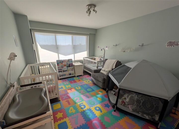 Property Photo: 18-15 215th Street 6 P NY 11360