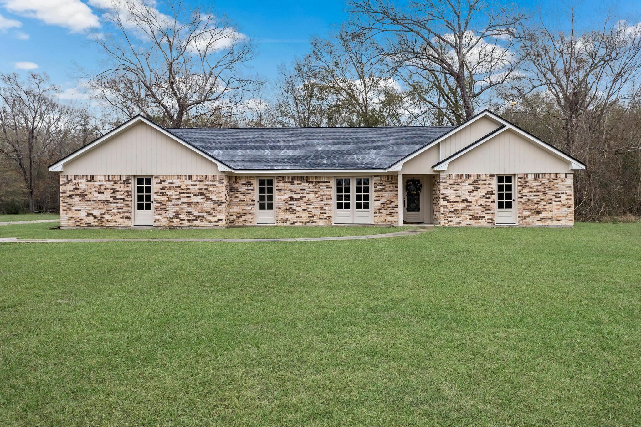Property Photo: 36044 Hwy 105 TX 77659