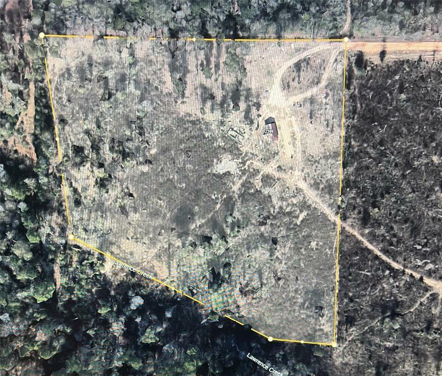 Property Photo: 2401 W Geronimo Trl TX 77328