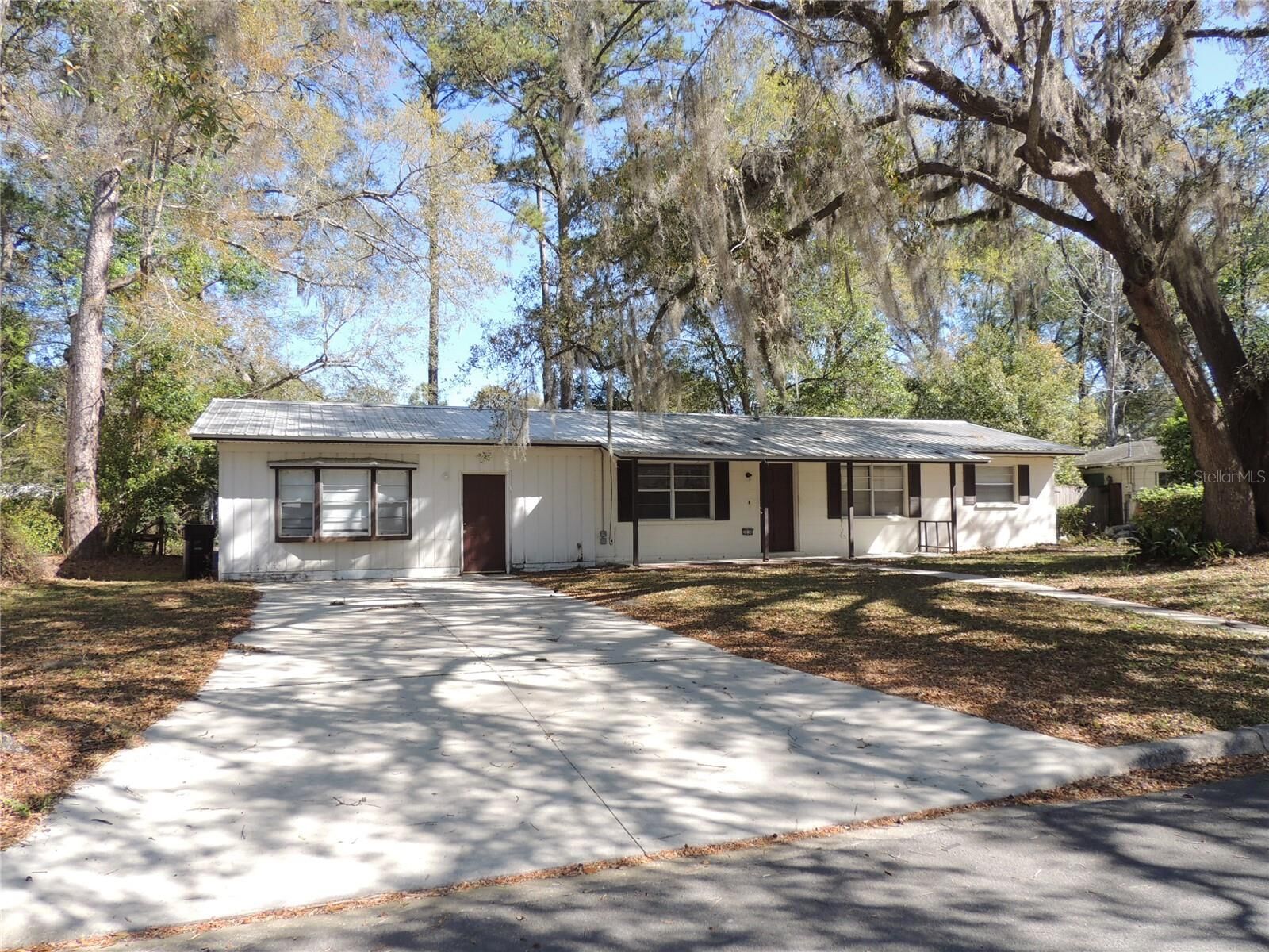 Property Photo:  3216 NW 46th Avenue  FL 32605 