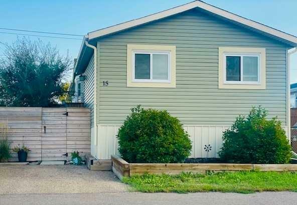 Property Photo: 15 Maple Drive AB T1R 1H8
