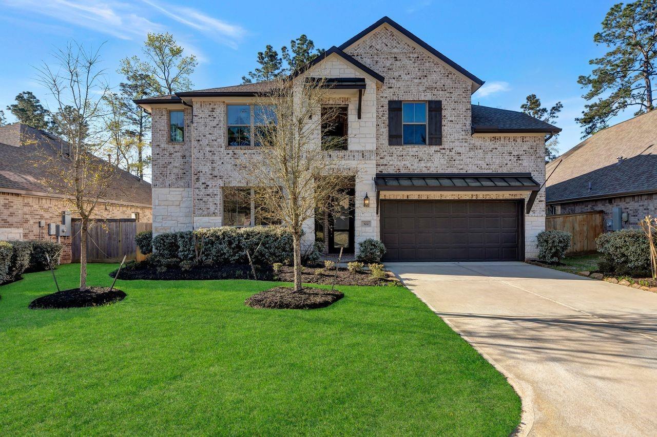 Property Photo:  322 S Cadence Hills Loop  TX 77318 