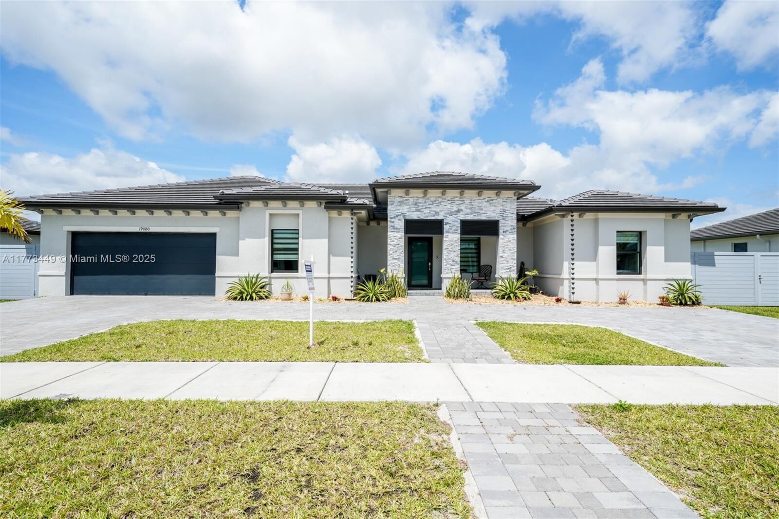 Property Photo:  19080 SW 133 Ct  FL 33177 