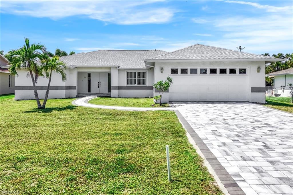 Property Photo: 5102 SW 15th Pl FL 33914