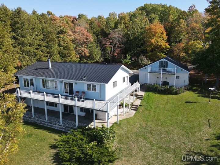 Property Photo:  7005 Mm.5 Lane  MI 49835 