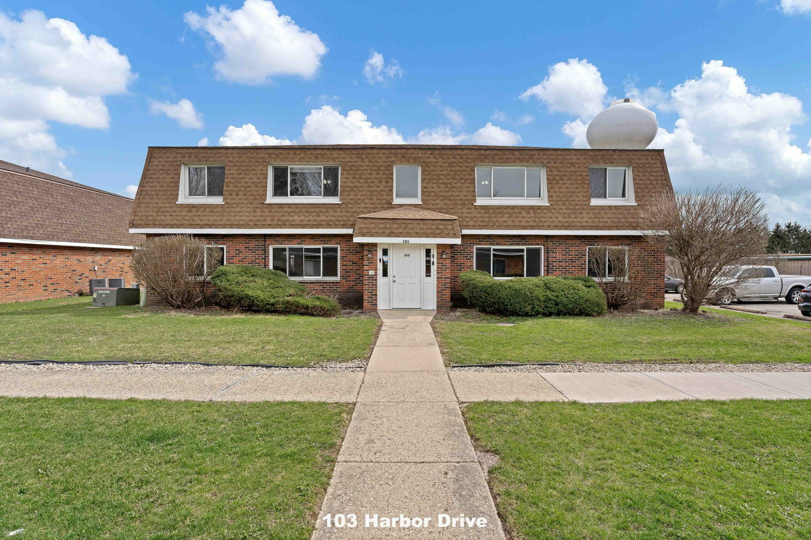 Property Photo: 103 Harbor Drive B IL 60543