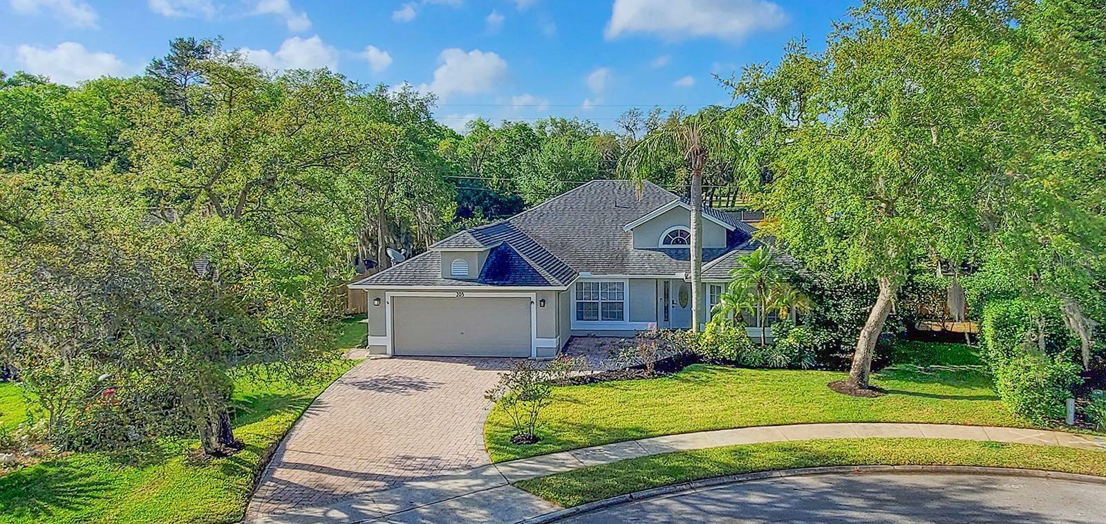 Property Photo: 203 Red Bud Court FL 32746