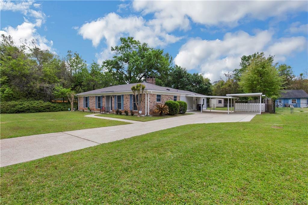 Property Photo: 6561 Sandra Drive AL 36582