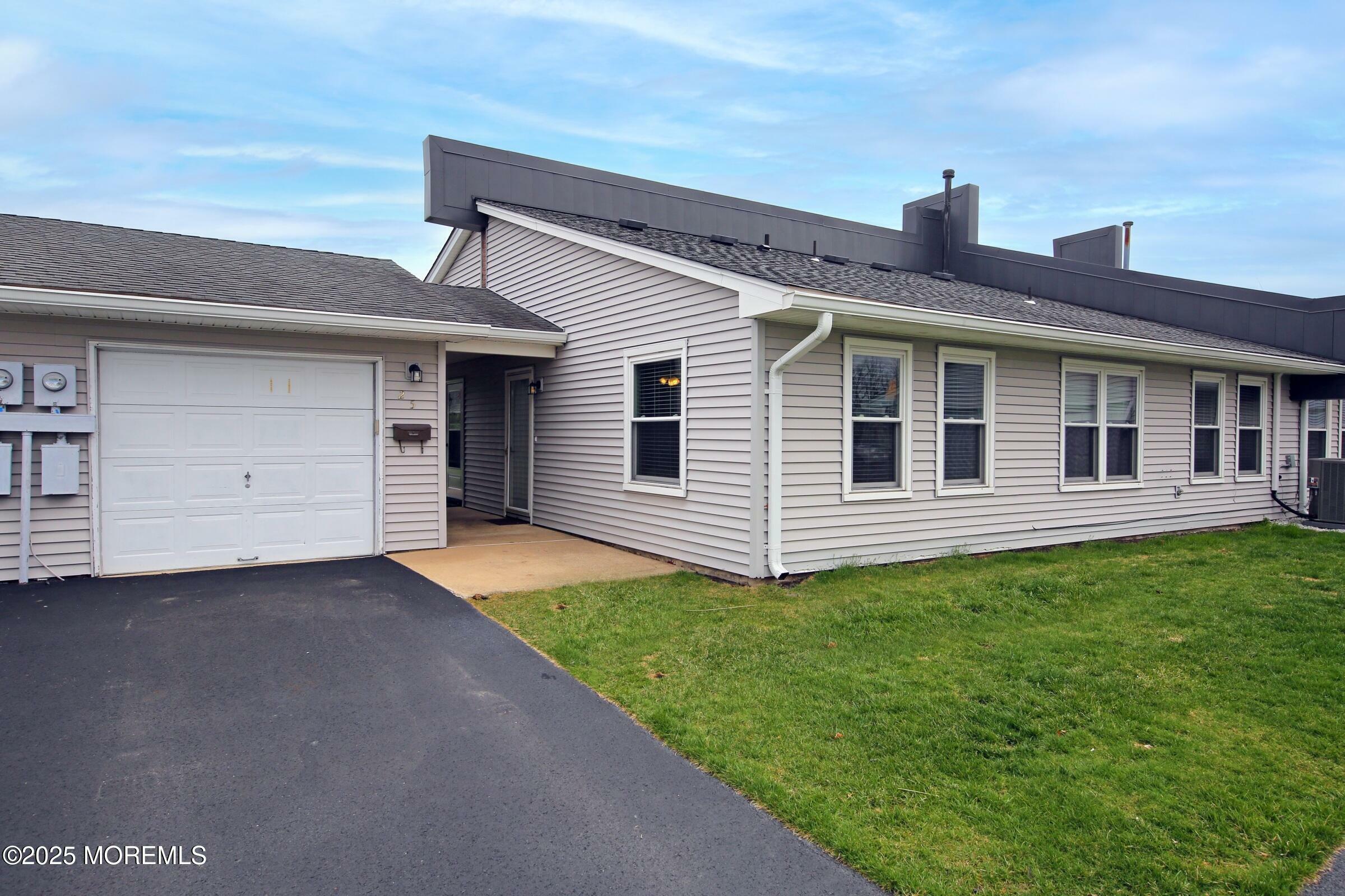 Property Photo: 25 Sutton Drive 2401 NJ 08724