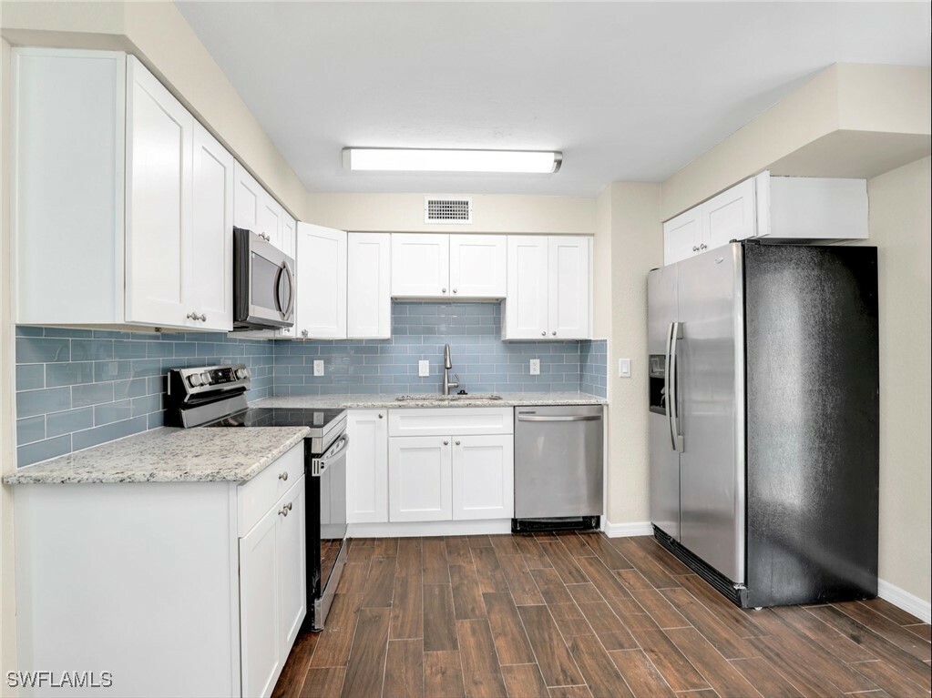 Property Photo: 3 Knights Bridge Road A2 FL 34112