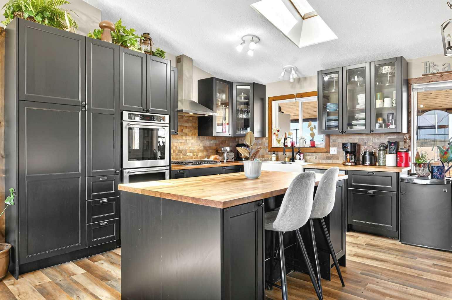 Property Photo: 482001 128 Street W AB T1S 6A1