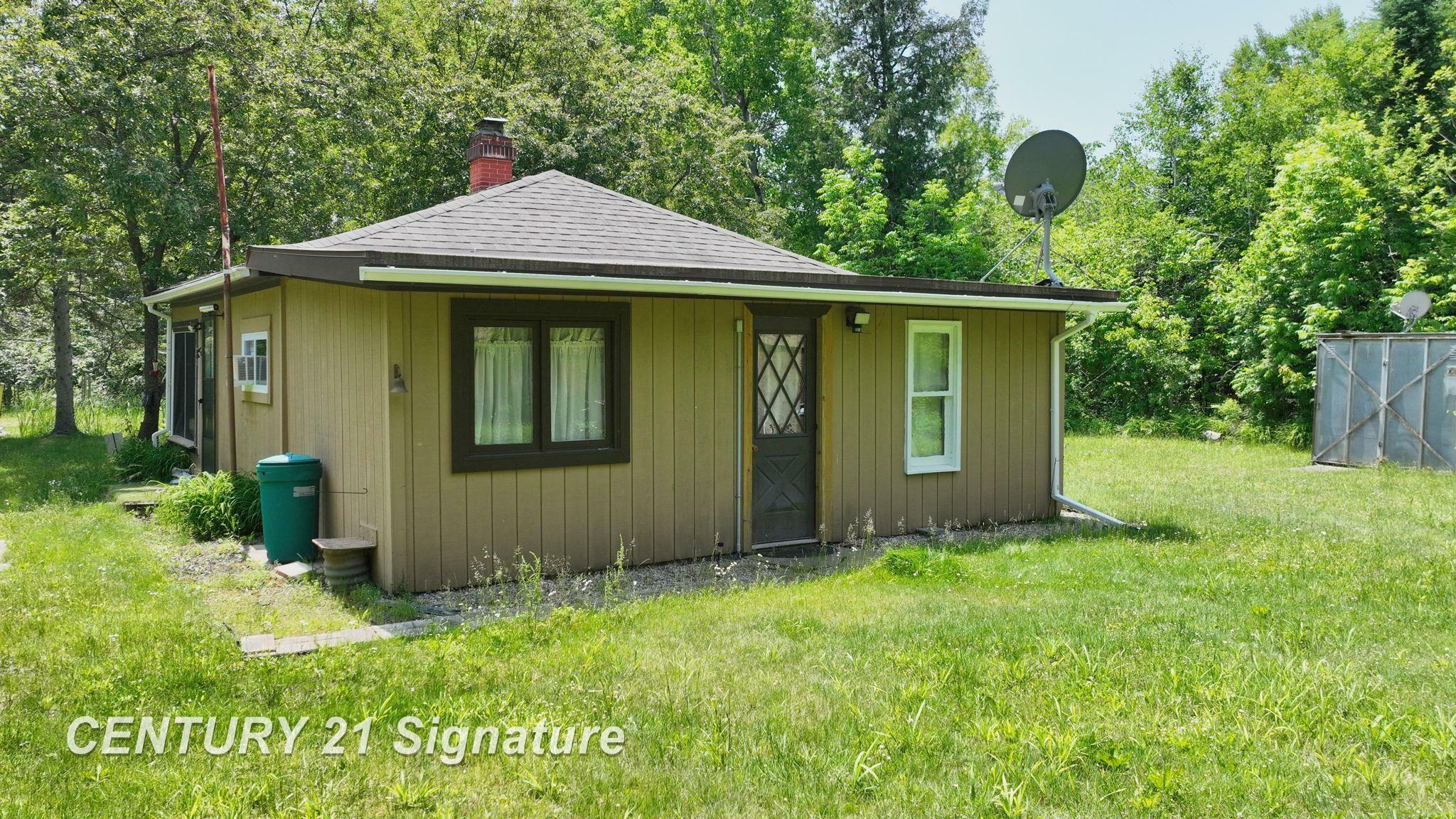 Property Photo: 6002 Wildwood Drive MI 48610