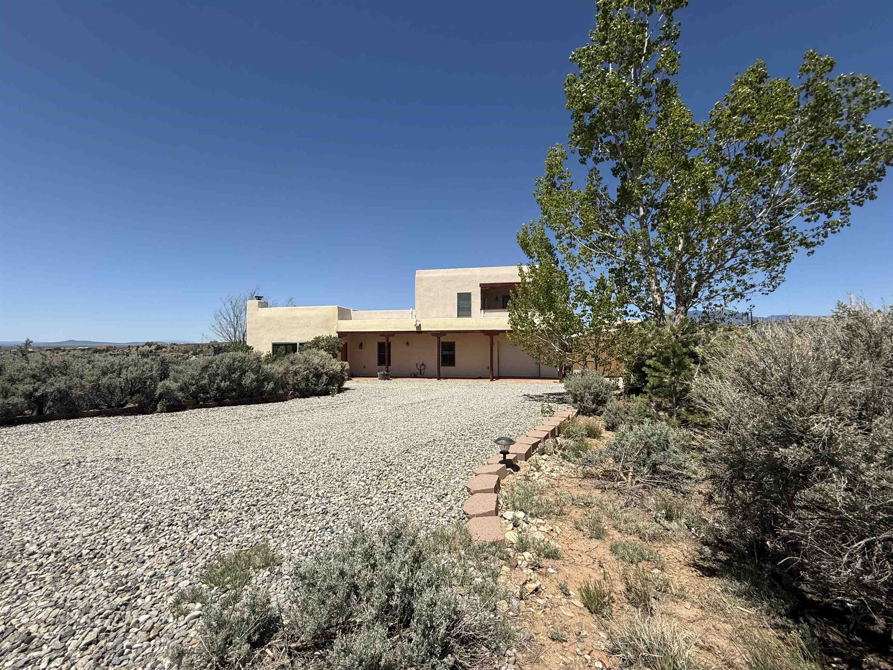 Property Photo:  70 Camino De Los Arroyos  NM 87557 
