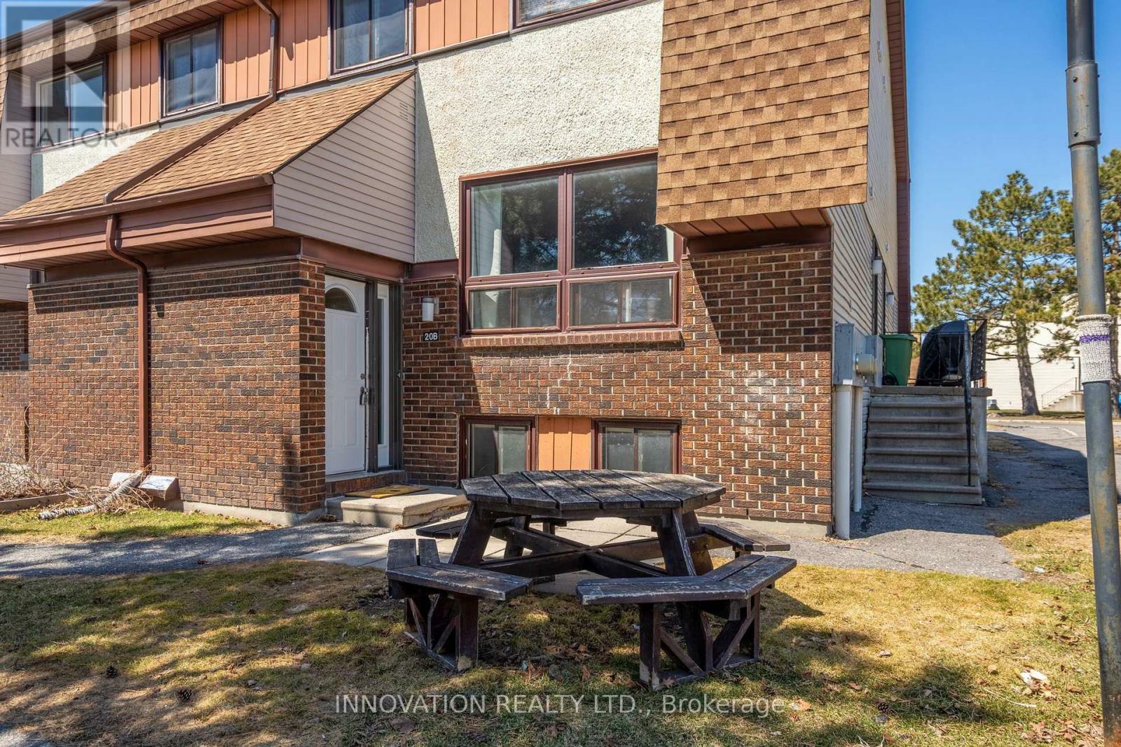 Property Photo: 20 Woodvale Green B ON K2G 4H2