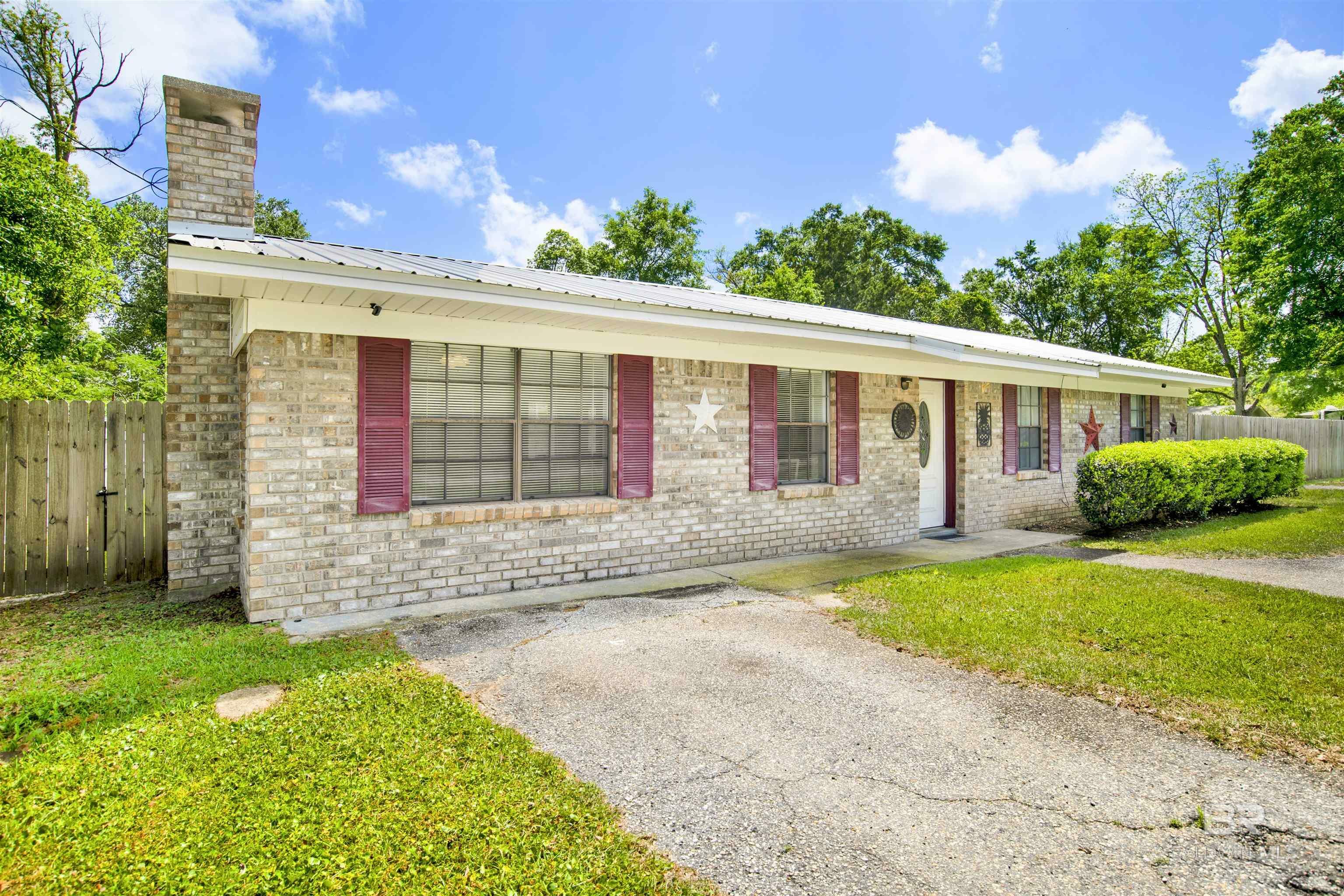 Property Photo: 411 W Camphor Avenue AL 36535