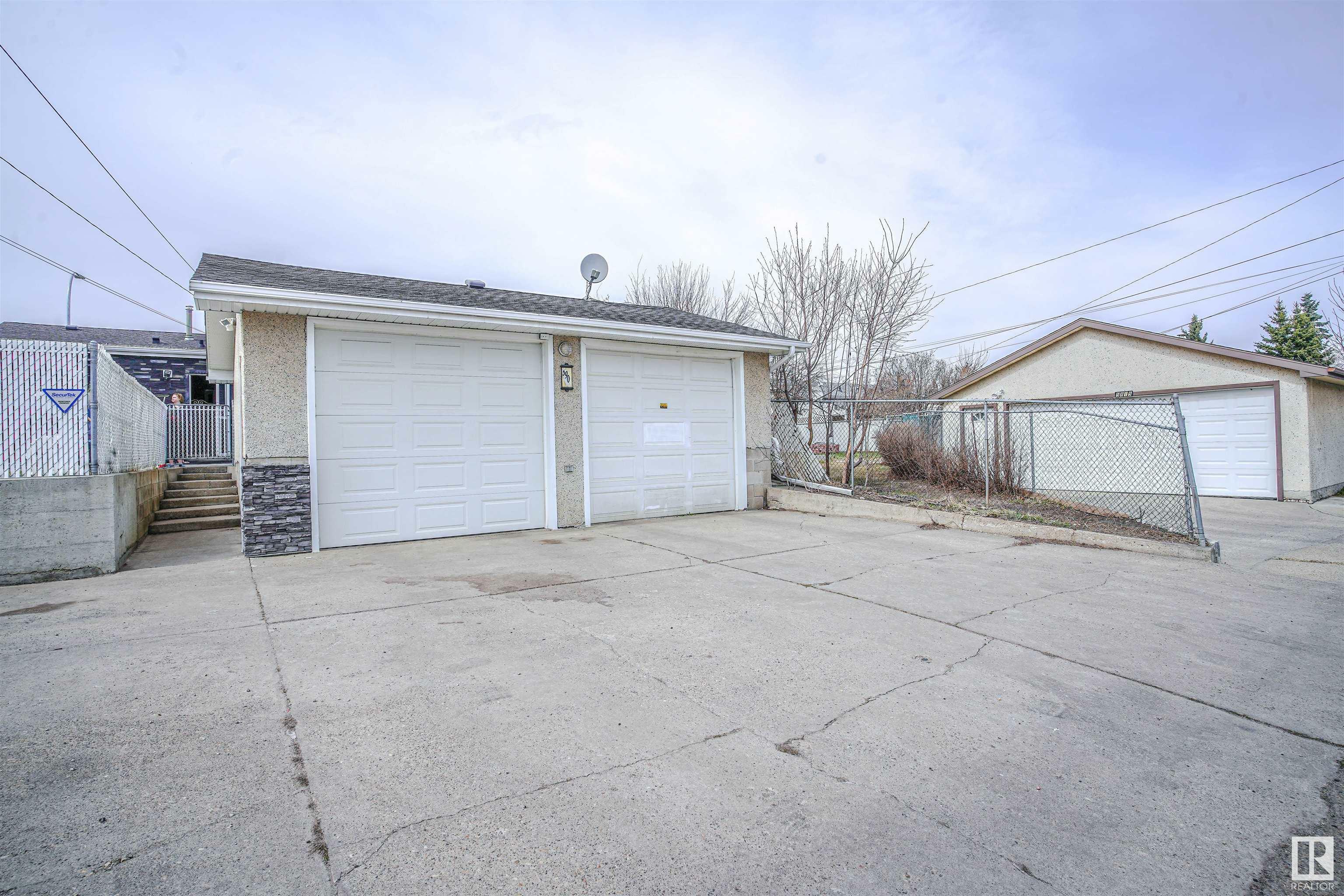 Property Photo: 5903 144 Avenue NW AB T5A 1K7
