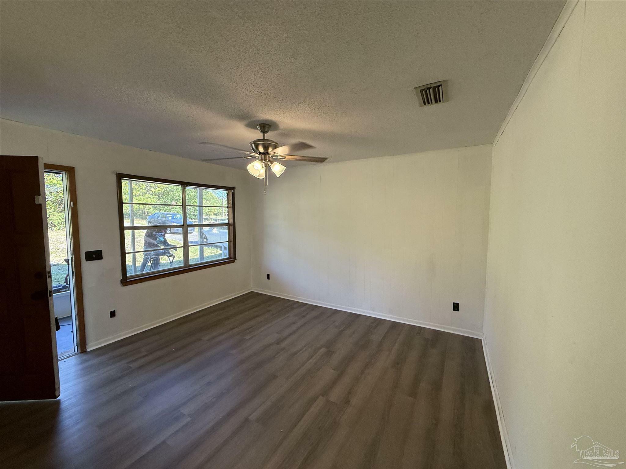 Property Photo:  7569 Woods Rd  FL 32526 