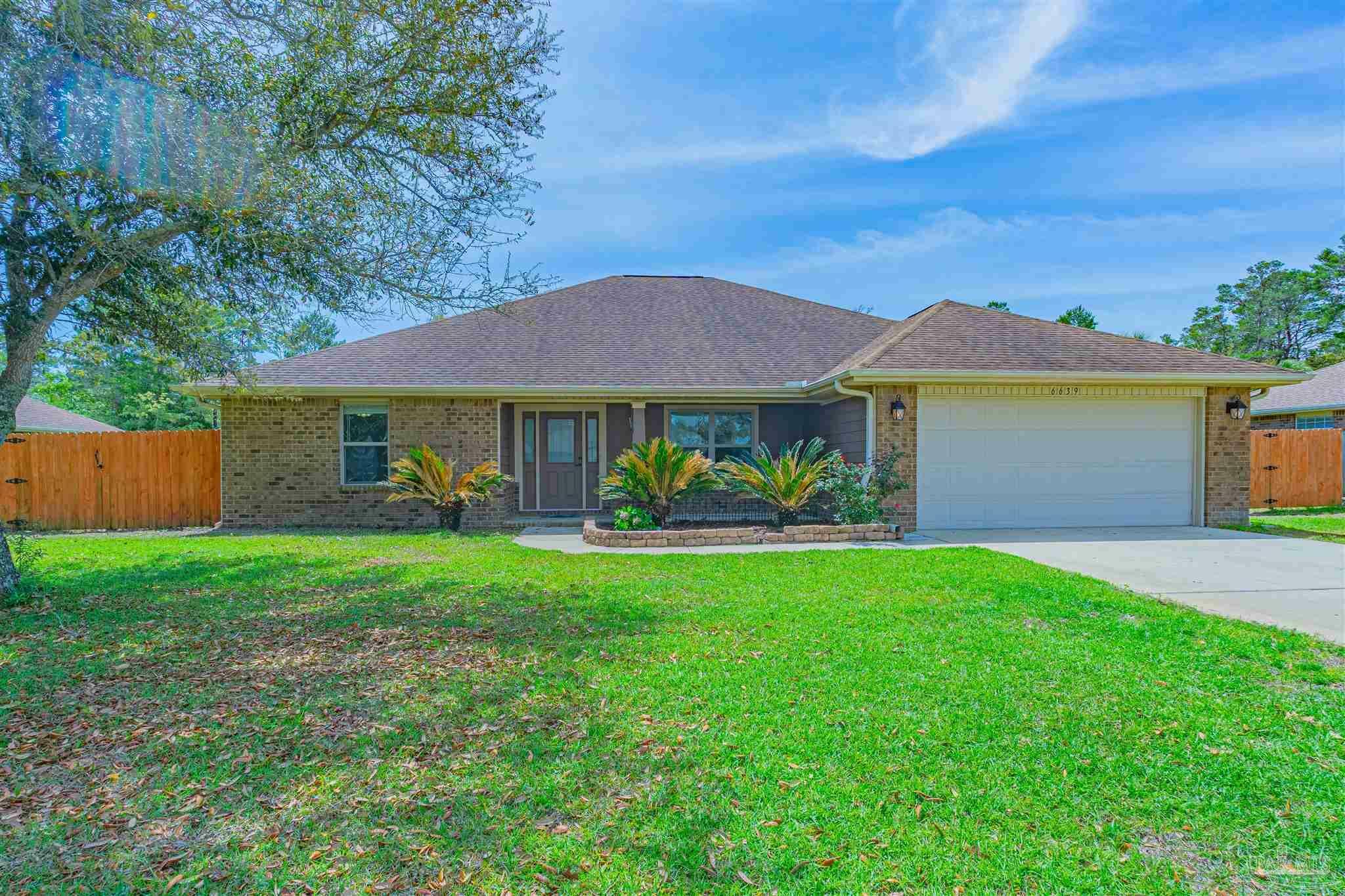 Property Photo:  6639 Castlewood St  FL 32566 