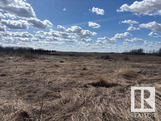 Property Photo:  2103 Ellerslie Road SW  AB T6X 1A7 