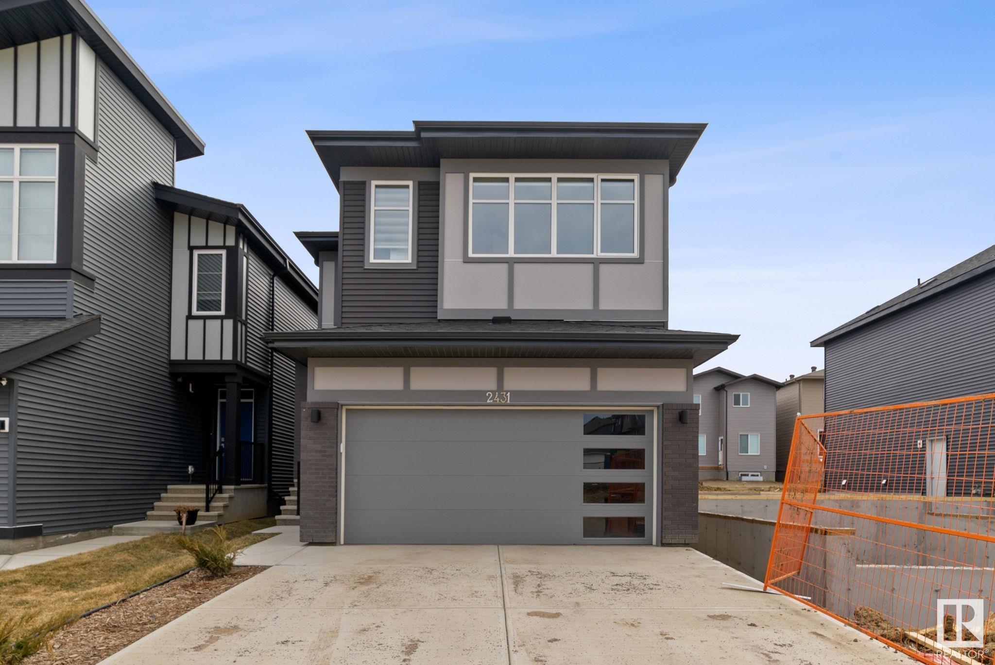 Property Photo: 2431 207 Street NW AB T6M 1P1