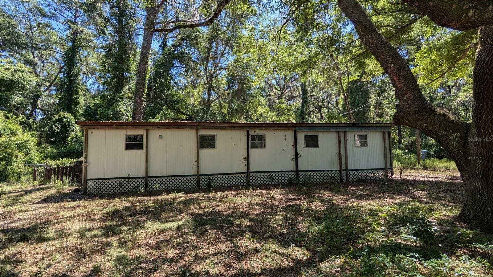 Property Photo:  303 SE 130th Terrace  FL 32641 