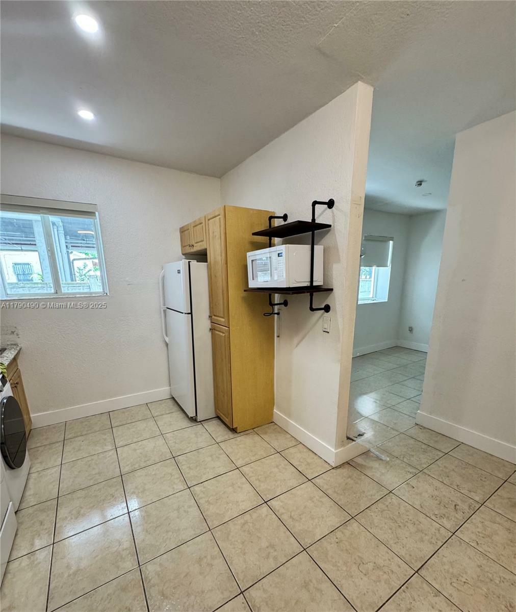 Property Photo: 1021 NW 3rd St 106 FL 33128