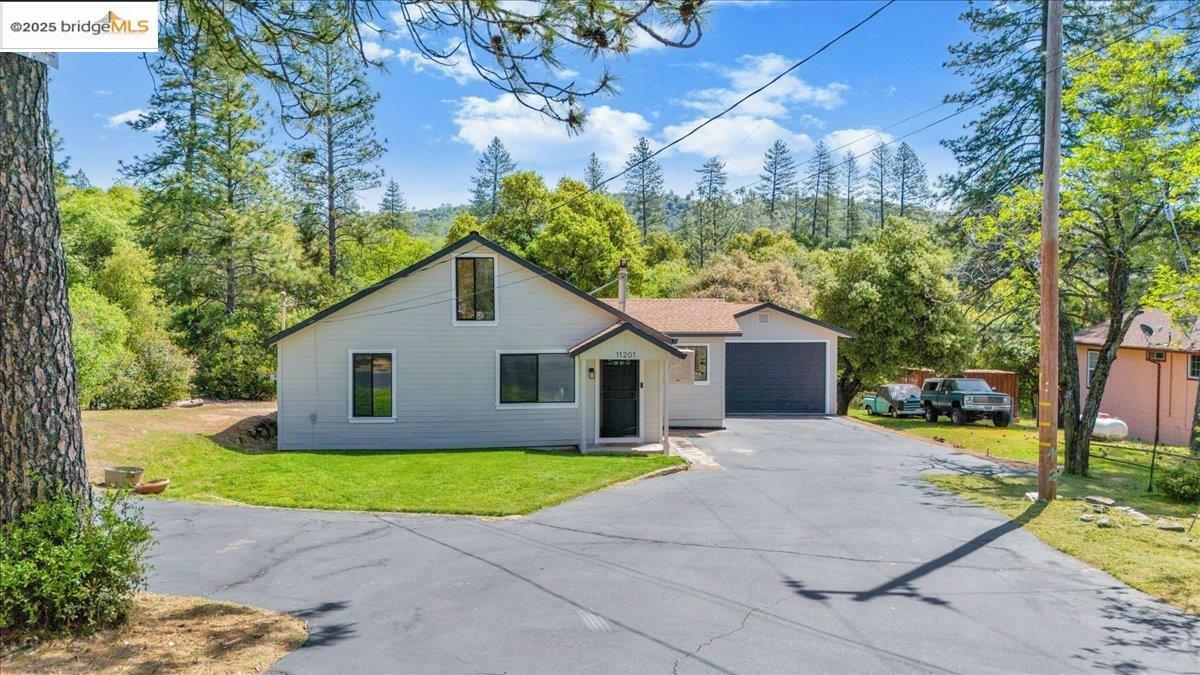 Property Photo: 11201 Big Oak Rd CA 95305