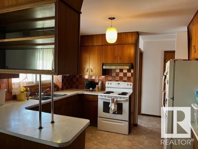 Photo de la propriété: 4610 52A Street AB T9C 1N3