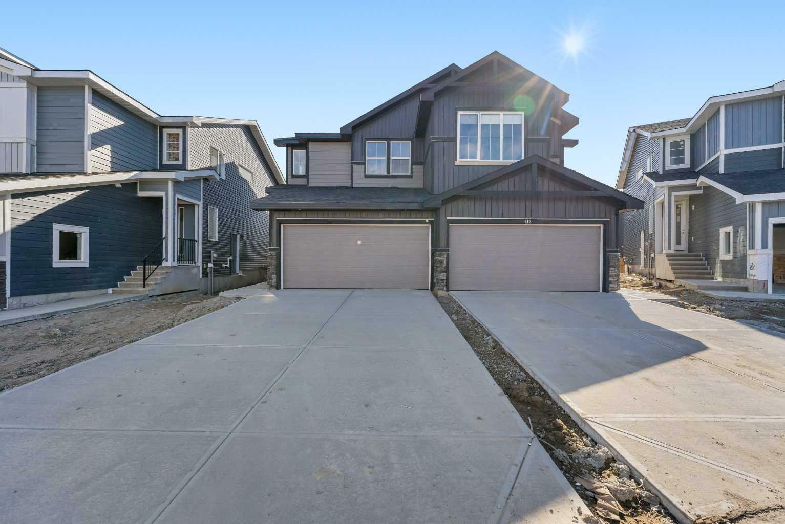 Property Photo: 108 Waterford Way AB T1X 3A2