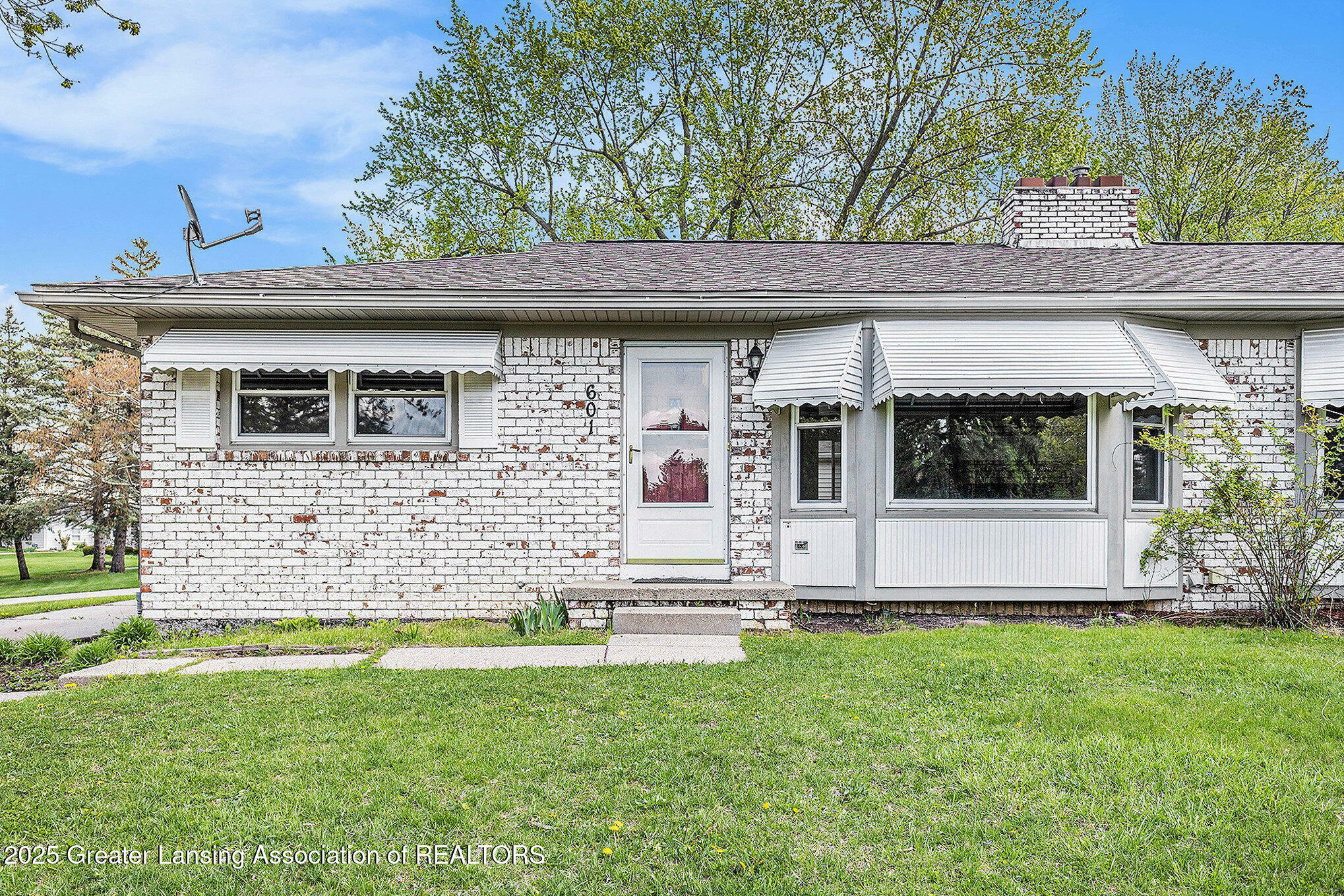 Property Photo: 601/603 Farmstead Lane MI 48917