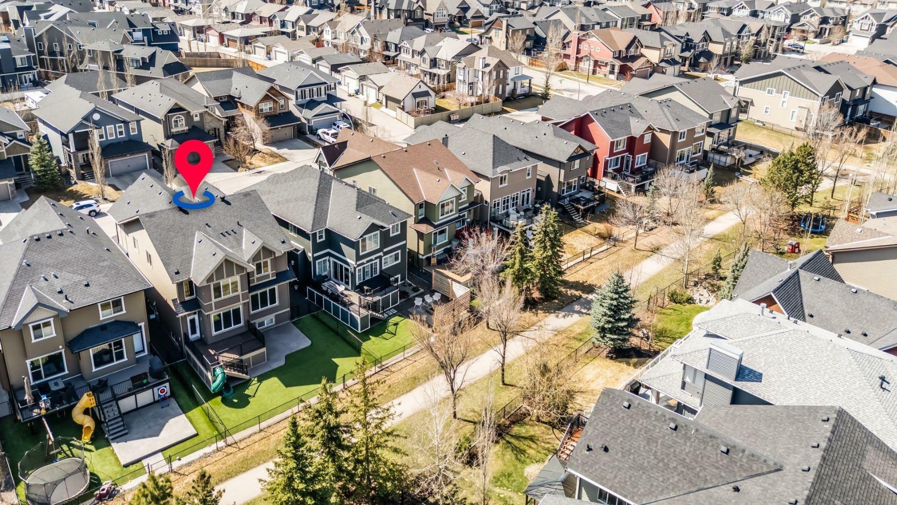Property Photo: 202 Cooperstown Lane SW AB T4B 2L2
