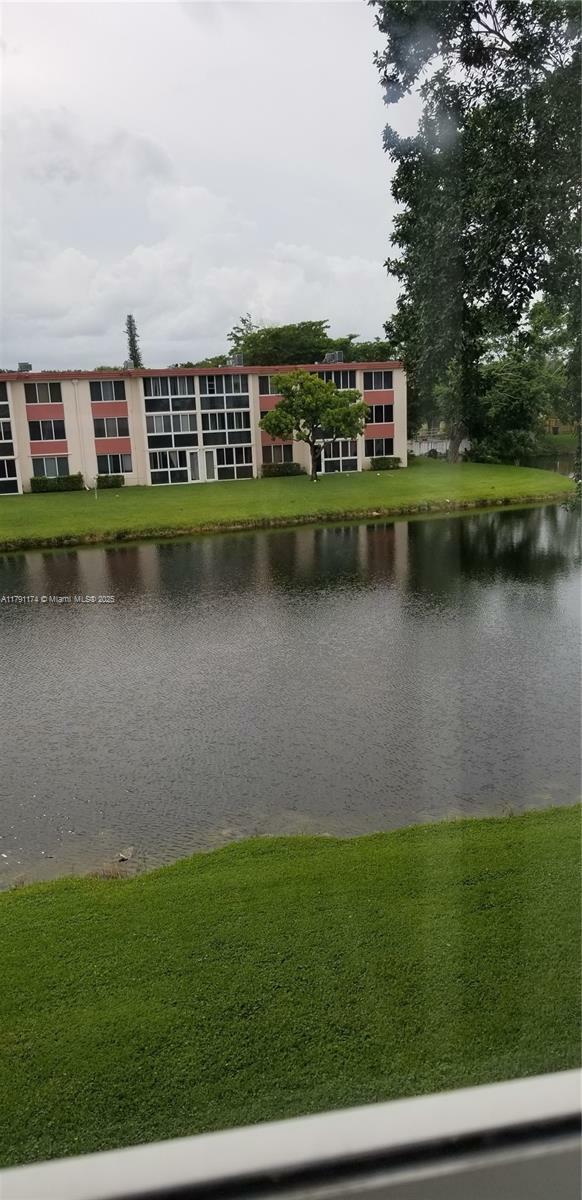 Property Photo:  1103 NW 58th Ter 321  FL 33313 
