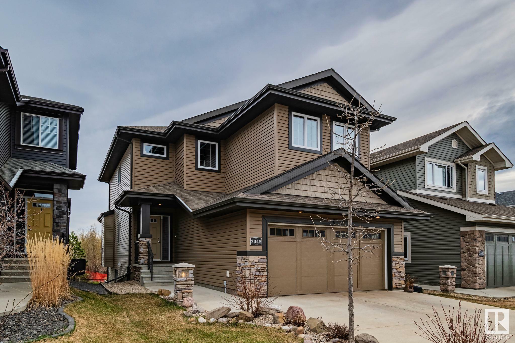 Property Photo: 2048 Redtail Common NW AB T5S 0H3