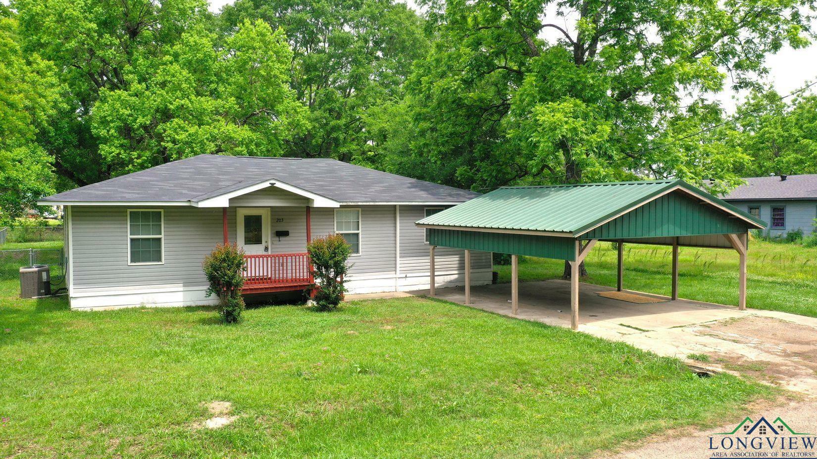 Property Photo: 203 E Douglas Street TX 75657