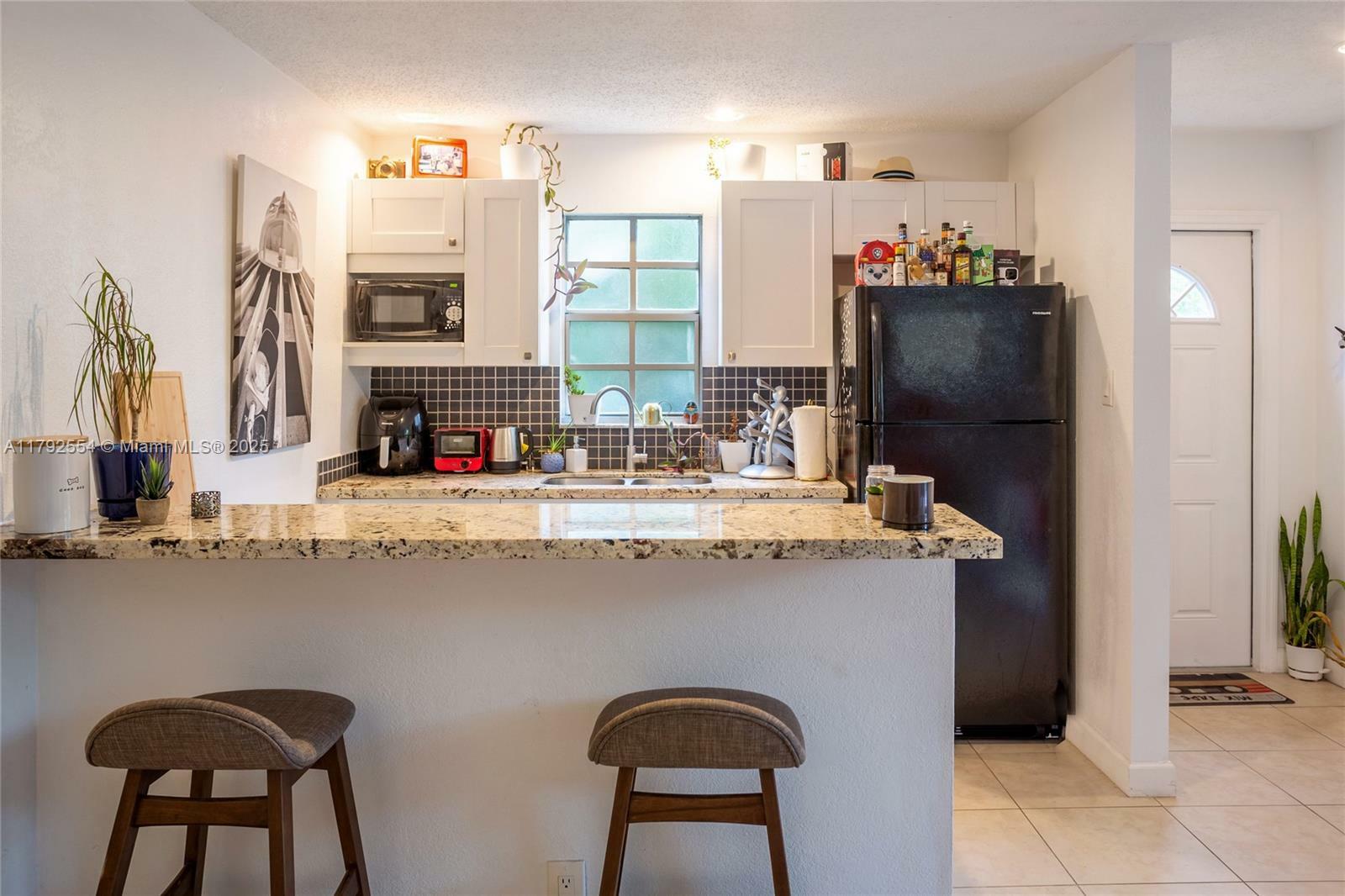 Property Photo: 1229 NE 16th Ter 1 FL 33304
