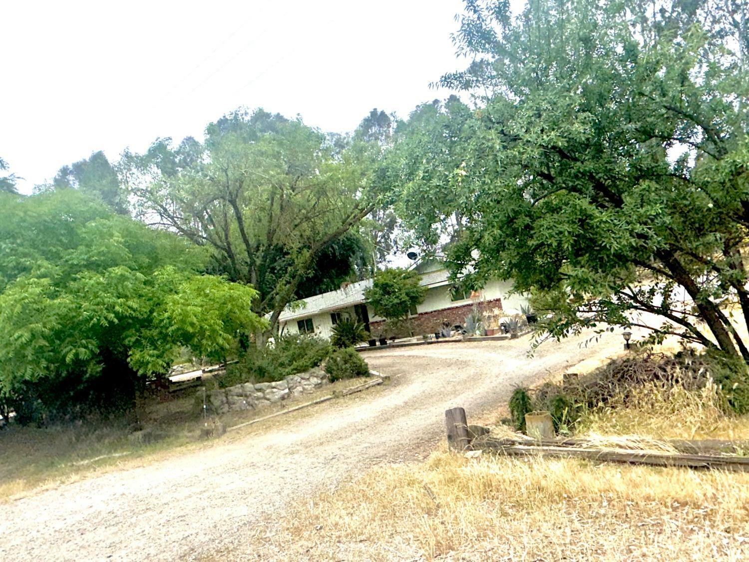Property Photo:  7763 E McKinley Avenue  CA 93737 