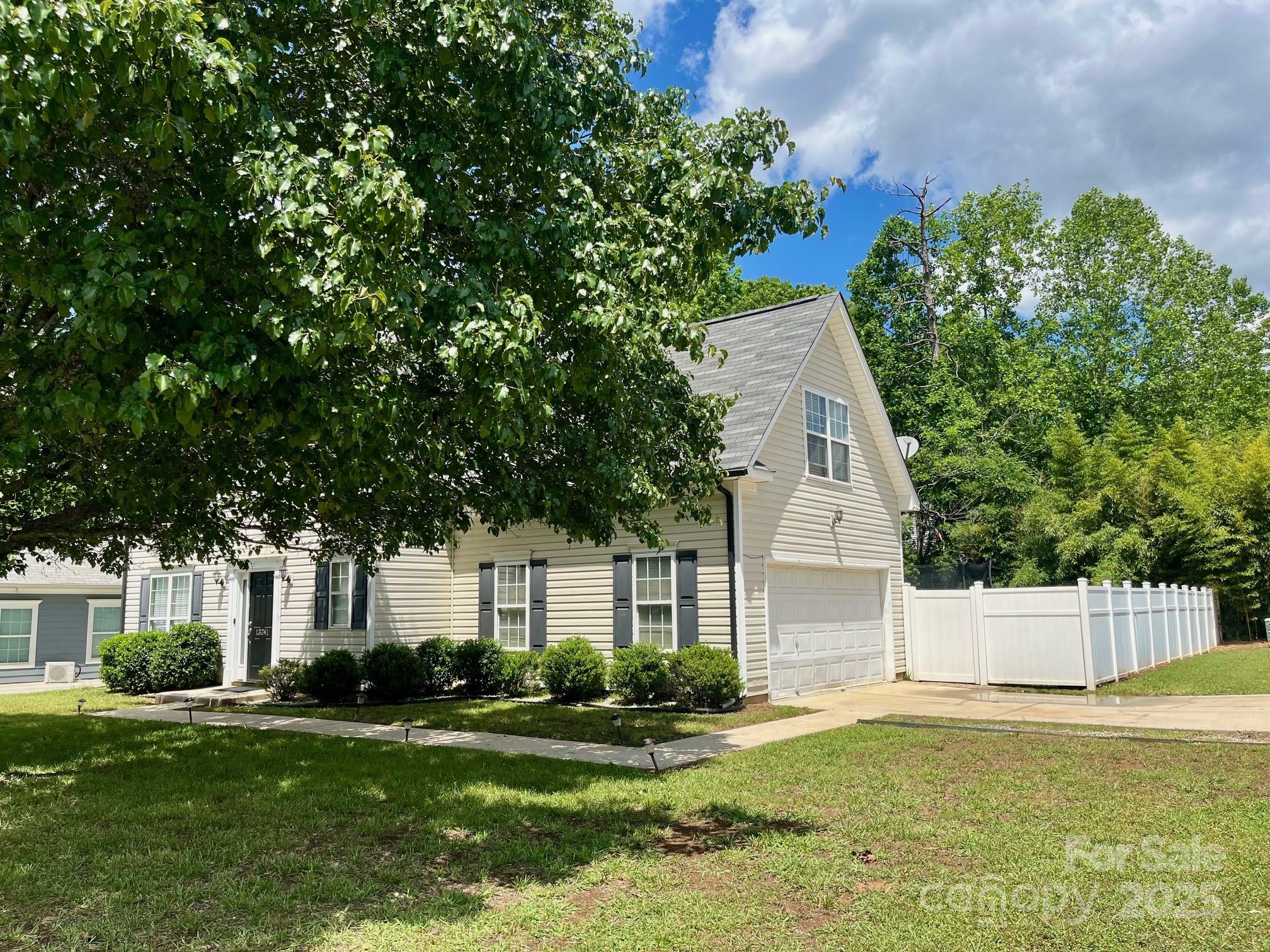 Property Photo: 13241 Woodland Farm Drive NC 28215