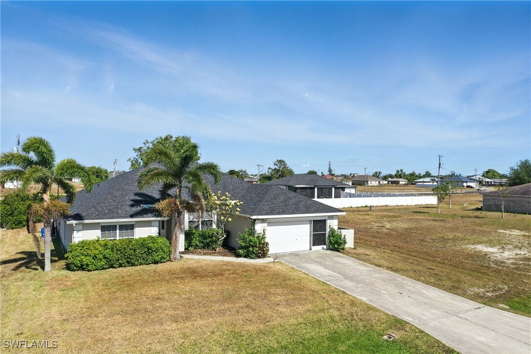 Property Photo: 1409 NW Juanita Place FL 33993