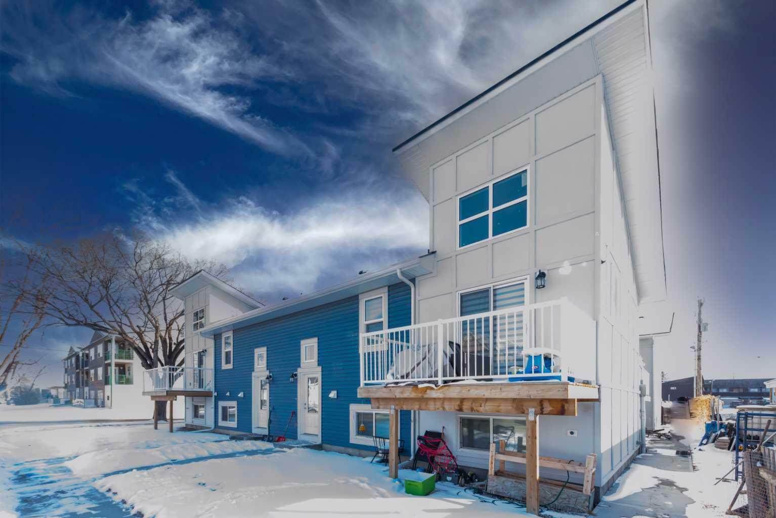 Property Photo: 41 7 Avenue SE 3 AB T1V 1E9