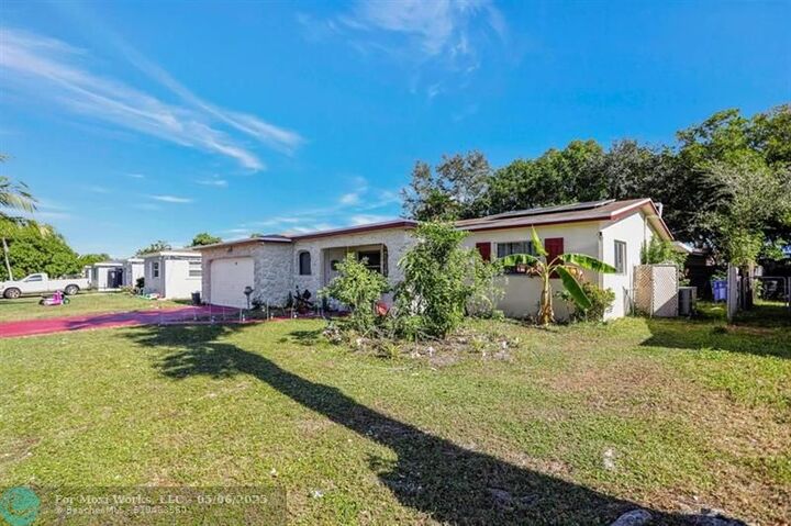 Property Photo: 156 NW 80th Ave FL 33063