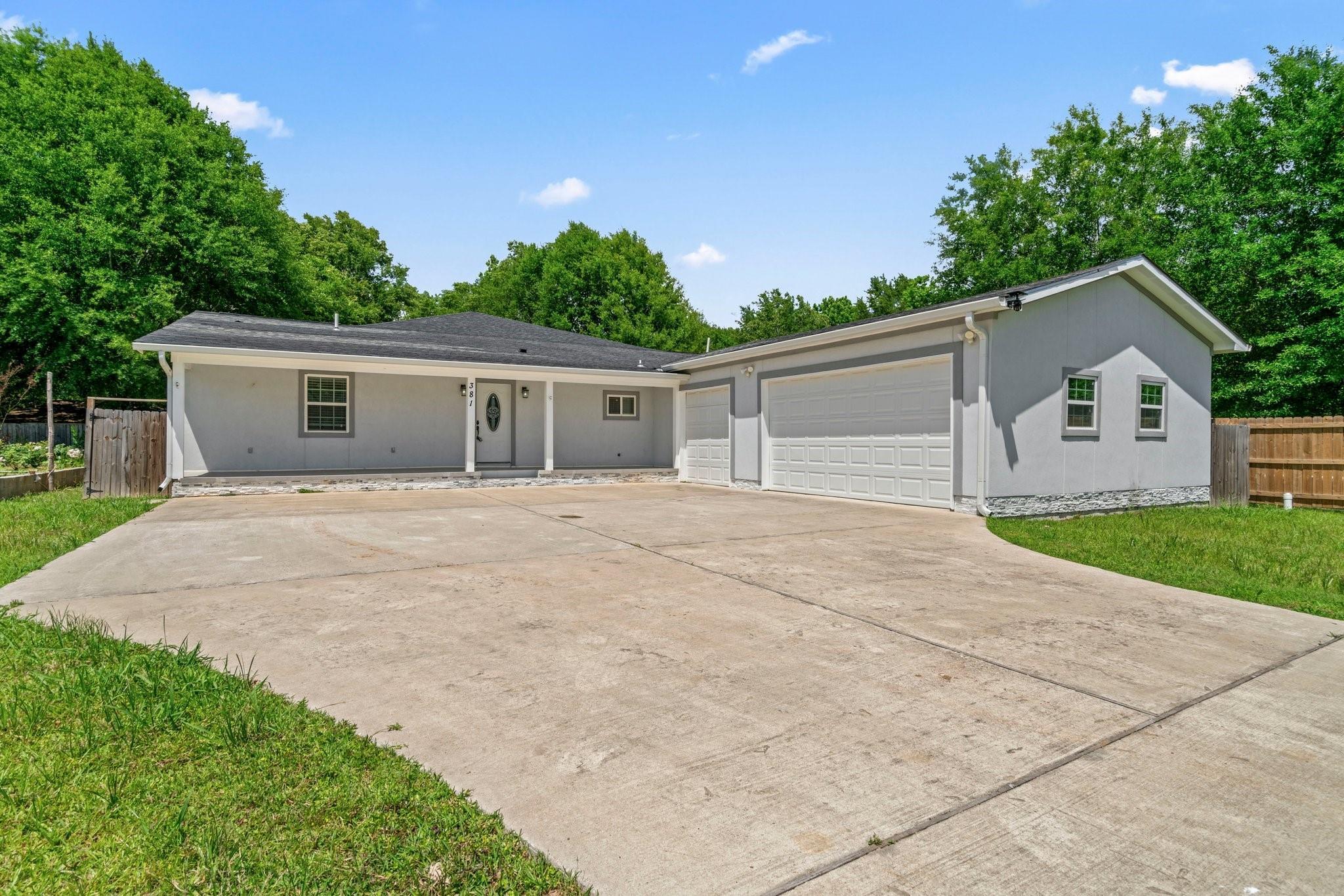 Property Photo: 381 County Road 3404 TX 77327