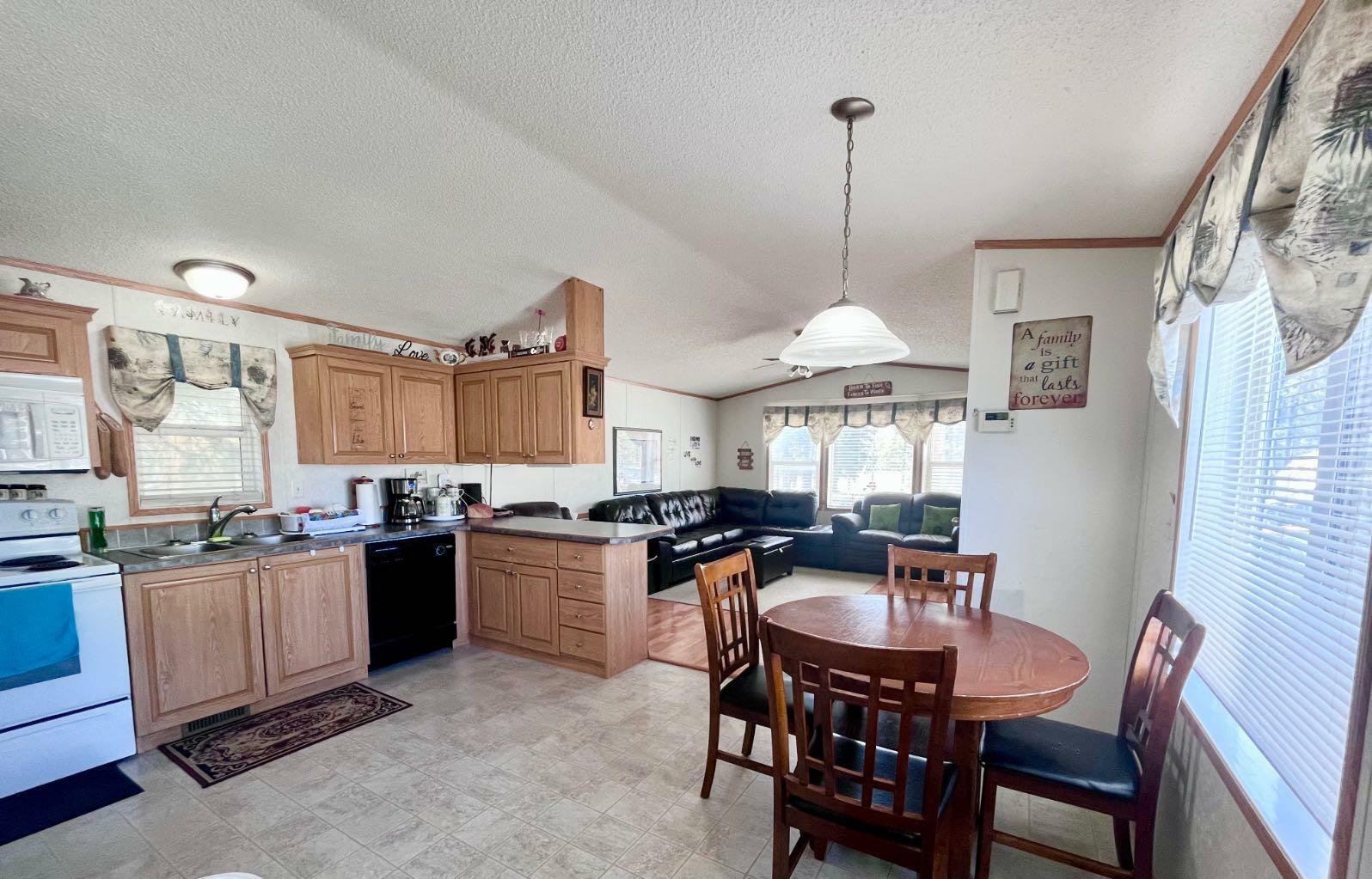 Property Photo: 145 East River Road 8 AB T7V 1S2