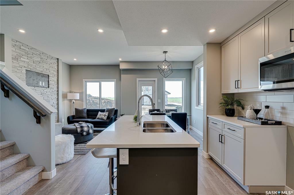 Property Photo: 202 Antonini Court SK S7L 7P3