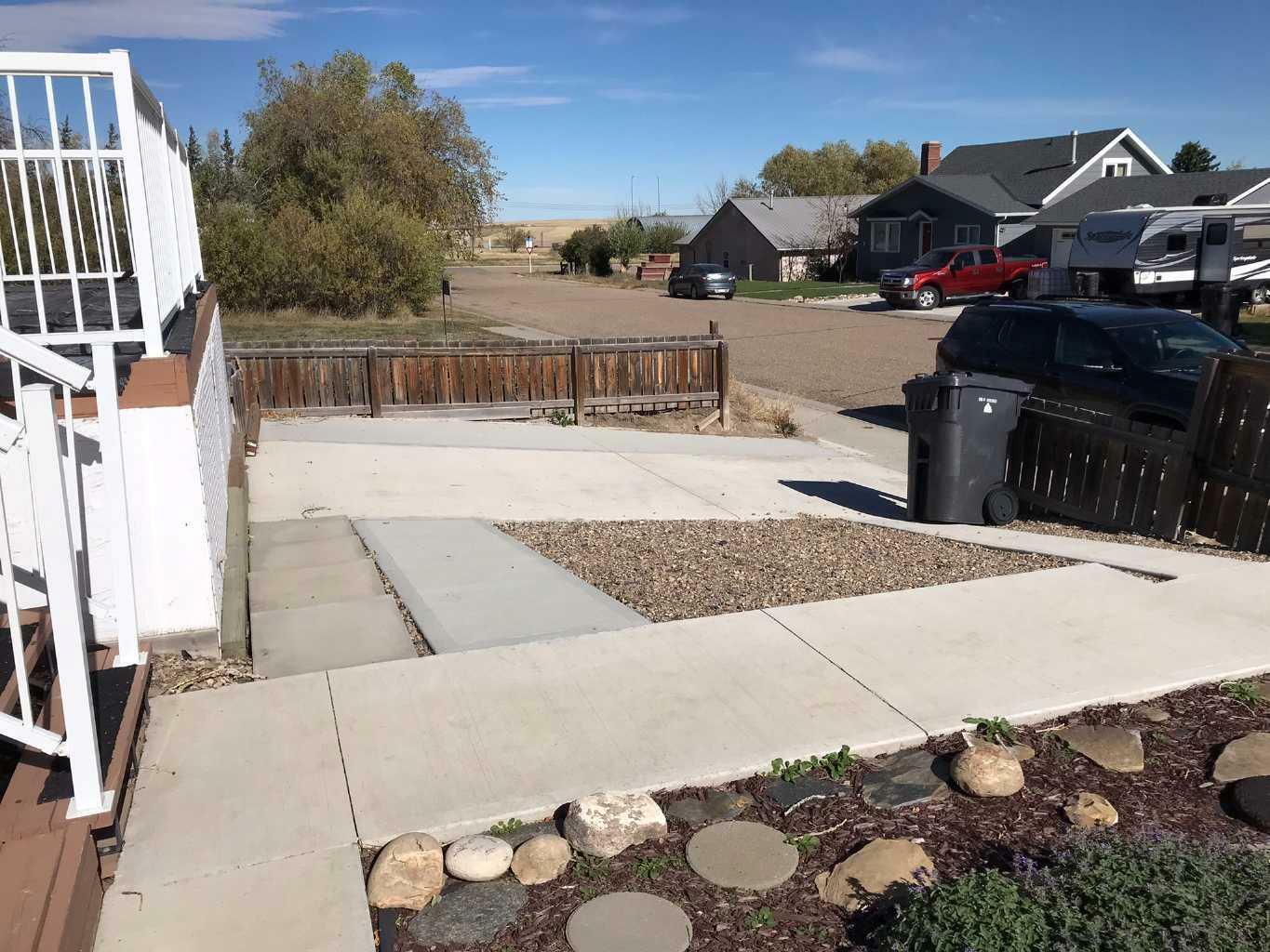 Property Photo: 208 2A Street W AB T0K 0N0